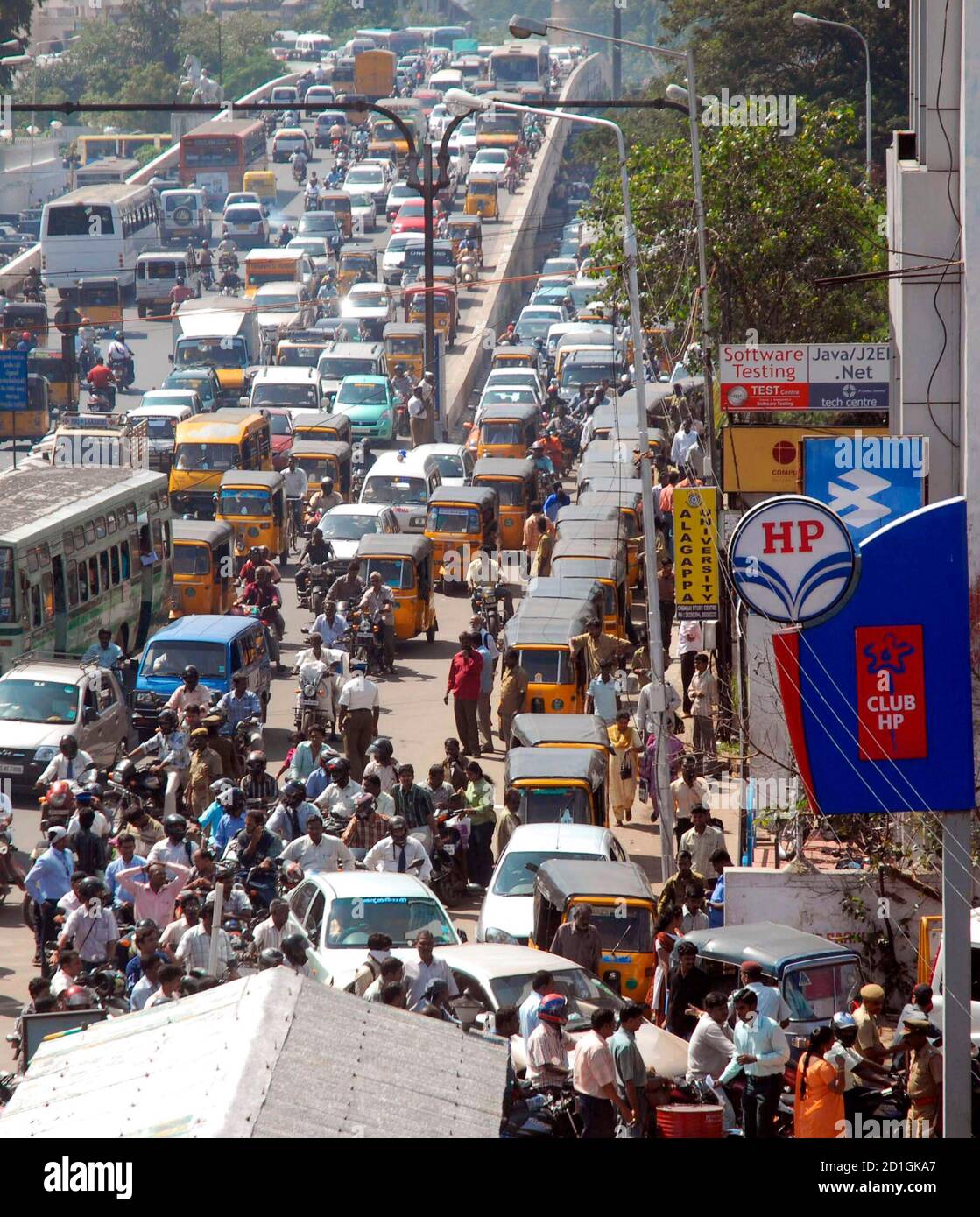 Vehicles jam outside a gas station in the southern Indian city of Chennai  January 9, 2009. Long queues at petrol pumps jammed rush-hour traffic in  major Indian cities and flights were delayed