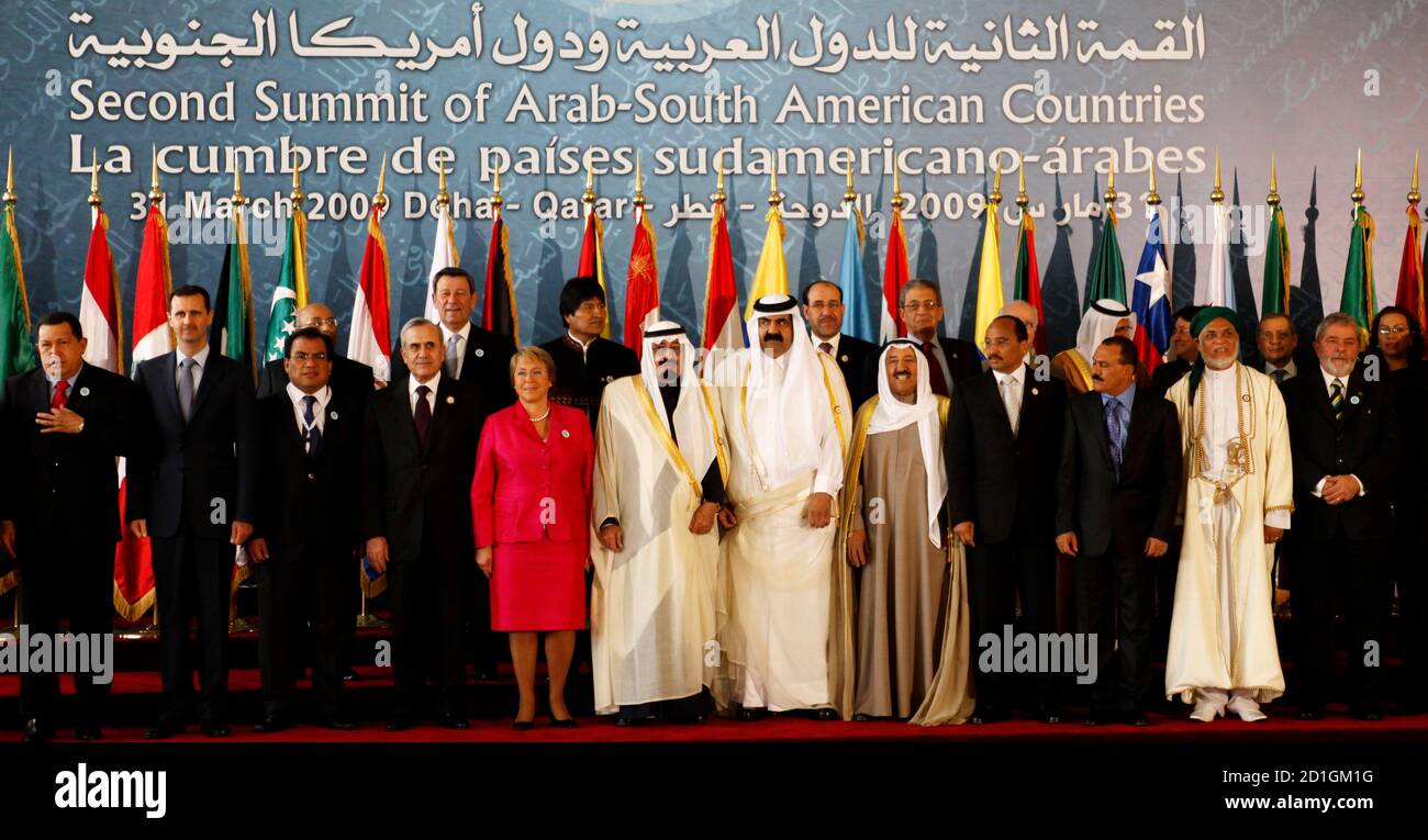 Arab and Latin American leaders pose for a group photograph at the end of  opening session of the second Summit of Arab and South American Countries  in Doha March 31, 2009. REUTERS/Ahmed