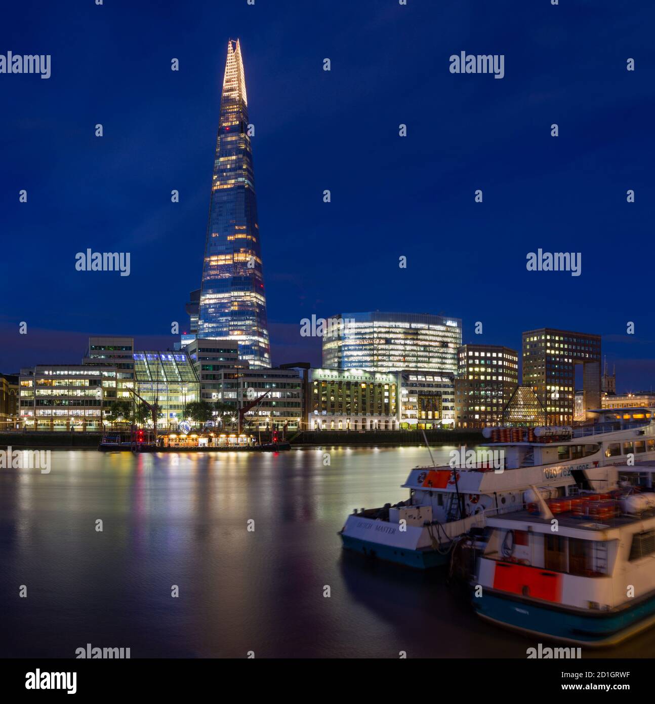 LONDON, GREAT BRITAIN - SEPTEMBER 13, 2017: The Shard and riverside at dusk. Stock Photo
