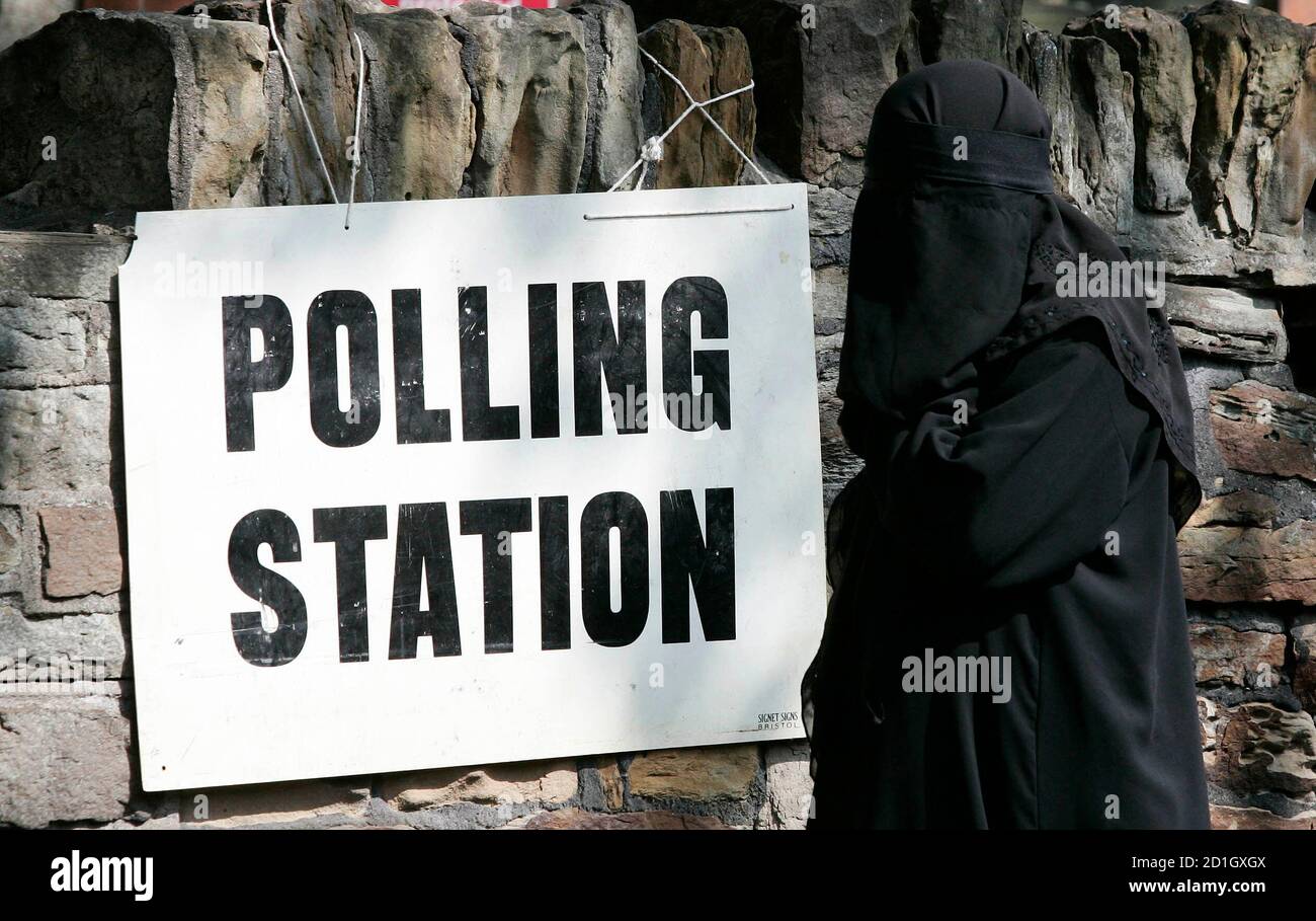 A women arrives at a polling station to vote in the English local elections near Dewsbury, northern England, May 3 2007.  Prime Minister Tony Blair faced the final electoral test of his decade in power on Thursday, a vote that could set Scotland on course for a referendum on independence from Britain. REUTERS/Phil Noble (BRITAIN) Stock Photo