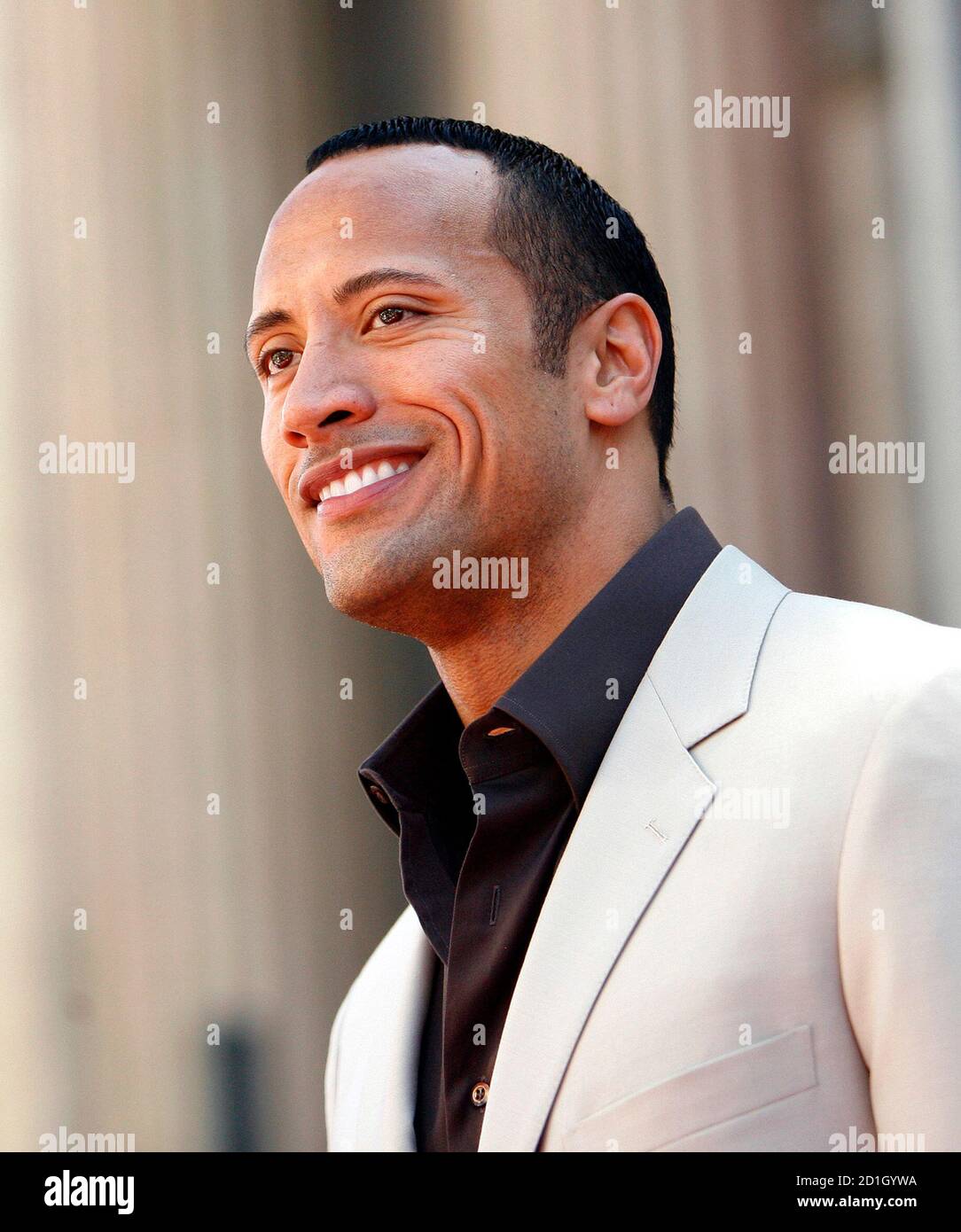 Cast member Dwayne "The Rock" Johnson poses at the premiere of "The Game  Plan" at El Capitan theatre in Hollywood, California September 23, 2007. The  movie opens in the U.S. on September