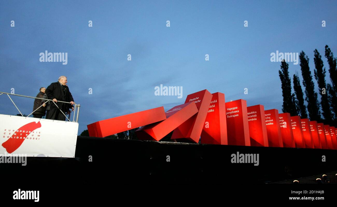 Former Polish President Lech Walesa watches collapsing domino pieces  symbolizing the beginning of the fall of communism in Gdansk Shipyard June  4, 2009. Poland marks the 20th anniversary of the first free