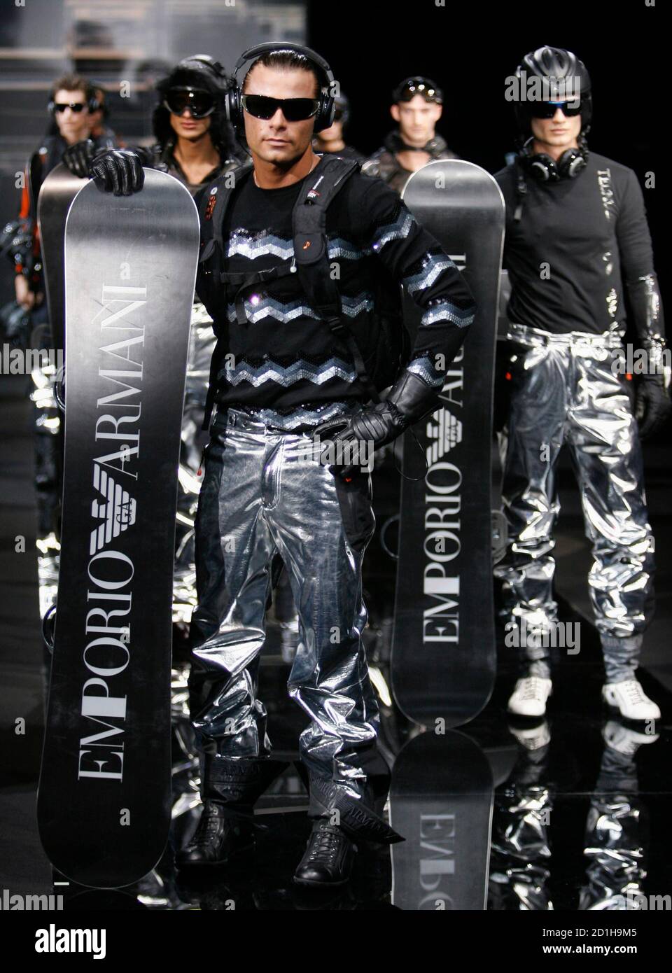 Models display creations as part of Emporio Armani's Fall/Winter 2007/08  men's collection during Milan Fashion Week January 15, 2007.  REUTERS/Alessandro Garofalo (ITALY Stock Photo - Alamy