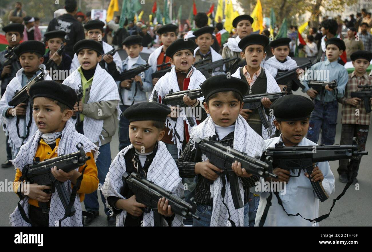 pakistani-shiite-muslim-children-hold-toy-guns-as-they-take-a-part-in-a-protest-against-the-israeli-offensive-in-gaza-in-lahore-january-20-2009-reutersmohsin-raza-pakistan-2D1HF6F.jpg