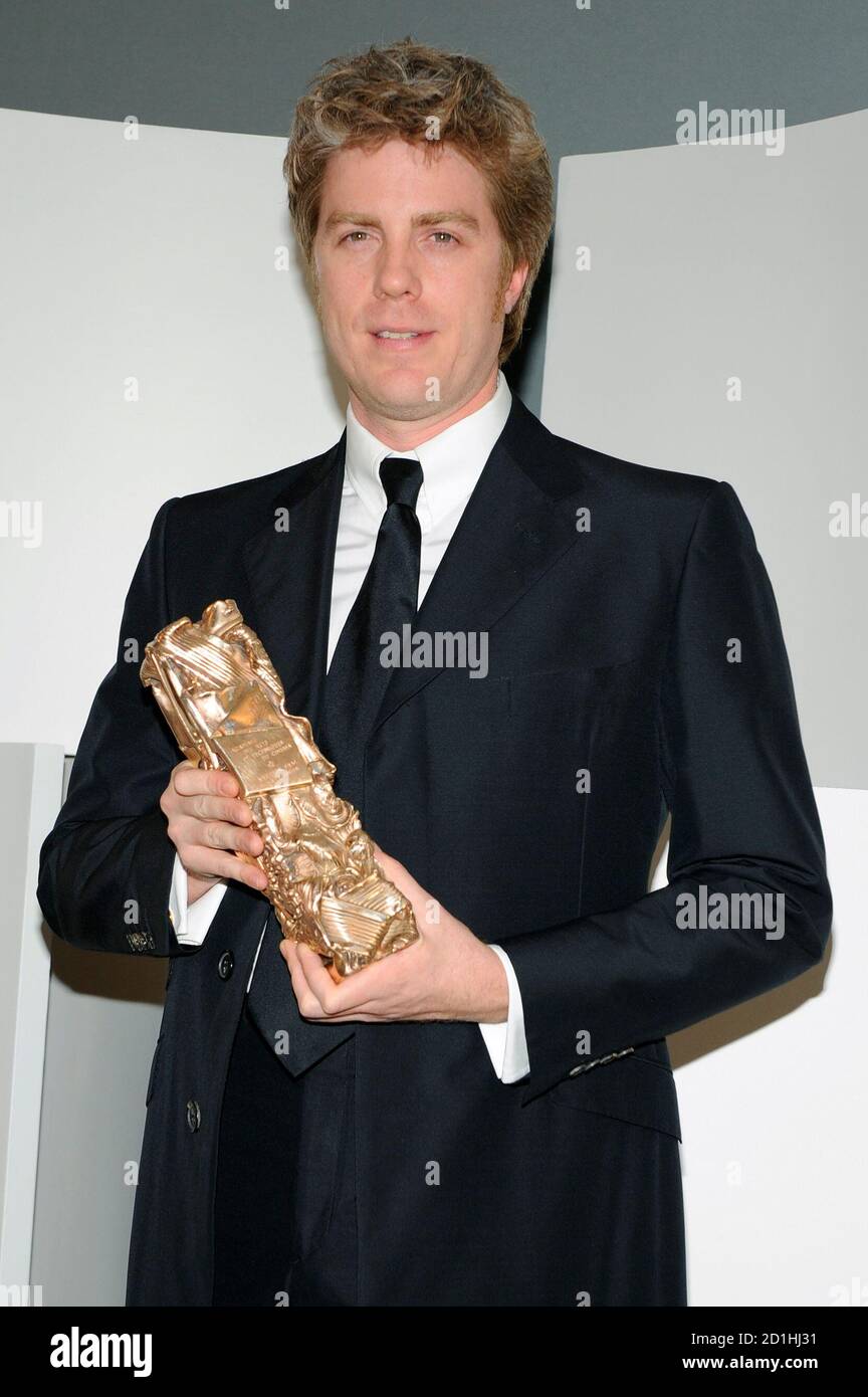 Kyle Eastwood Son Of U S Actor And Director Clint Eastwood Poses With His Father S Best Foreign Film Award For Gran Torino During The Cesar Awards Ceremony In Paris February 27 10 Reuters Gonzalo Kyle Eastwood Son Of U S Actor And Director Clint Eastwood Poses With His Father S Best Foreign Film Award For Gran Torino During The Cesar Awards Ceremony In Paris February 27 10 Reuters Gonzalo