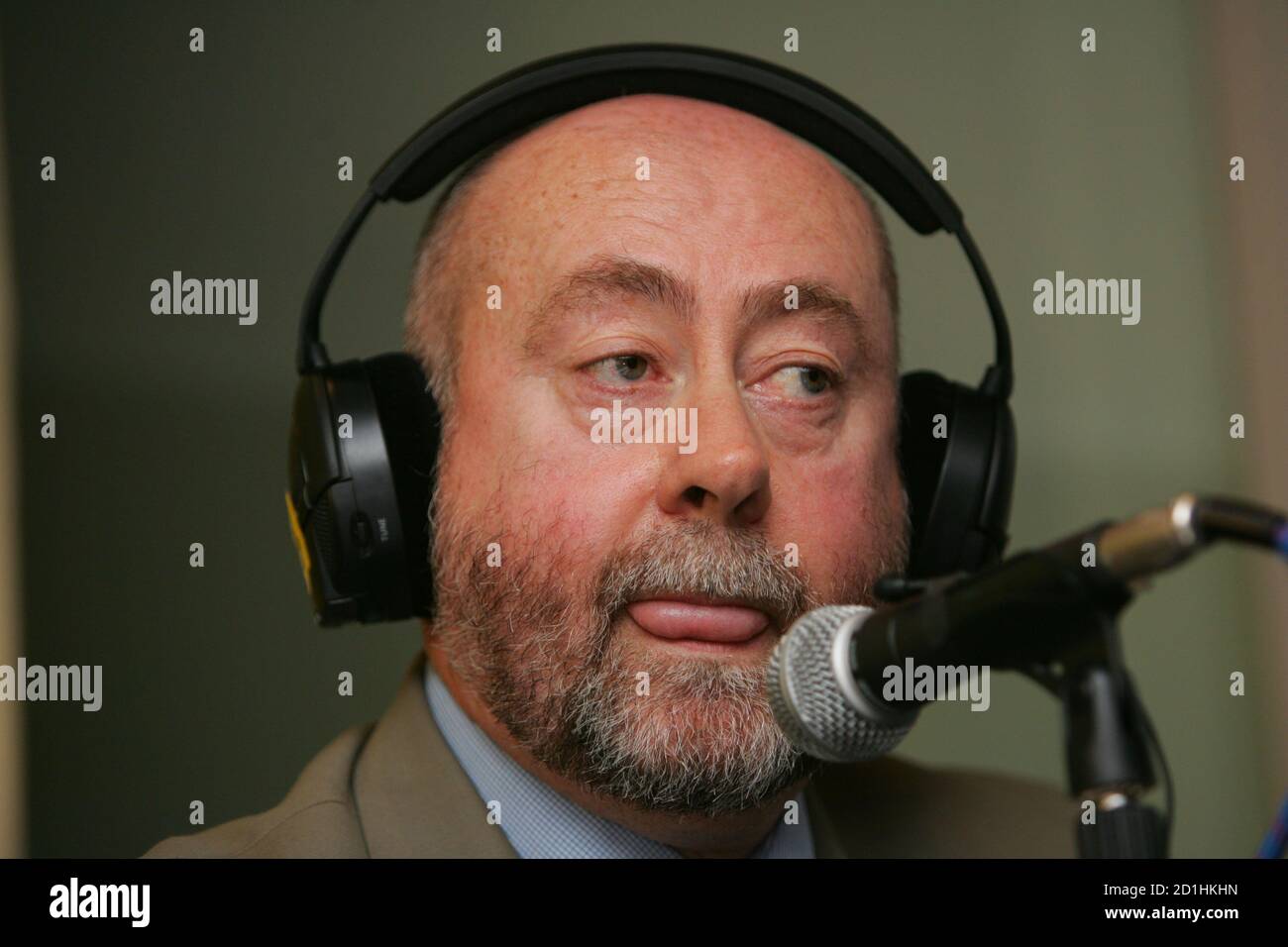 Dr Wouter Basson ponders a point during a news conference in Cape Town,  September 13, 2005. The ex-head of South Africa's germ warfare programme  denied knowledge of apartheid-era plots to murder black