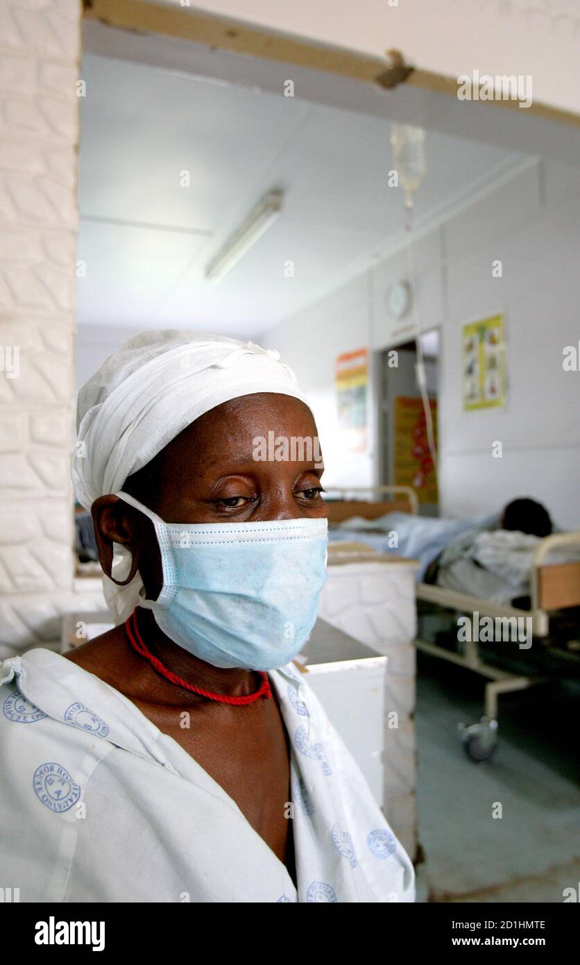 A patient who tested positive for extreme drug resistant tuberculosis (XDR-TB) awaits treatment at a rural hospital at Tugela Ferry in South Africa's impoverished KwaZulu Natal province, October 28, 2006. The new strain of the disease has killed at least 79 people in the area since January 2005, prompting concern from the World Health Organisation who fear XDR-TB could become a major killer in AIDS-hit parts of Africa where governments have been slow to roll out TB control programs. REUTERSMike Hutchings  (SOUTH AFRICA) Stock Photo