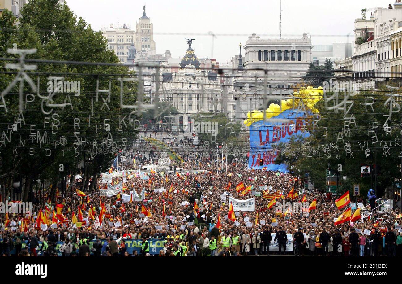 Thousands of demonstrators take part in a march to protest against the LOE, a Socialist government reform of the education system that, amongst other proposals, would change the way religion is taught in schools, in Madrid, November 12, 2005. [The demonstration, backed by the opposition Popular Party and the Church, is the second major church-backed demonstration in five months. Spain has one of the highest rates of high school dropouts in the European Union.] Stock Photo