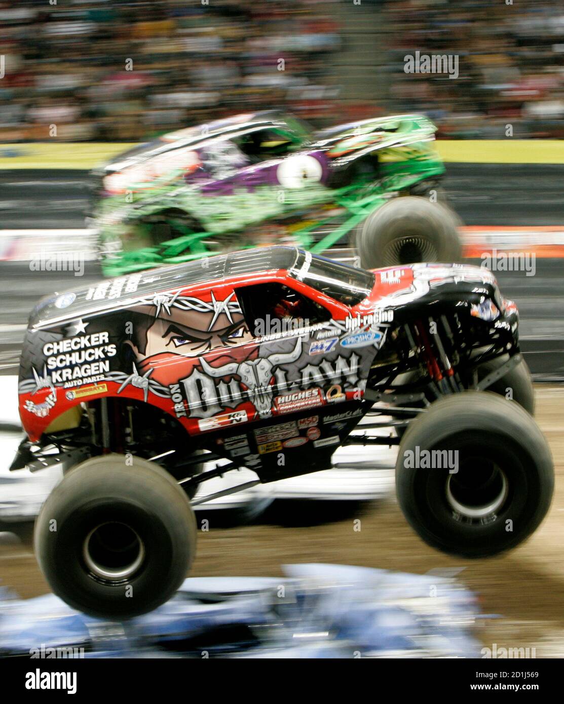 Linsey Weenk Driving Iron Outlaw Bottom Races With Charlie Pauken Driving Grave Digger Top At Monster Jam A Monster Truck Competition In Denver Colorado February 10 2007 Reuters Rick Wilking United States Stock