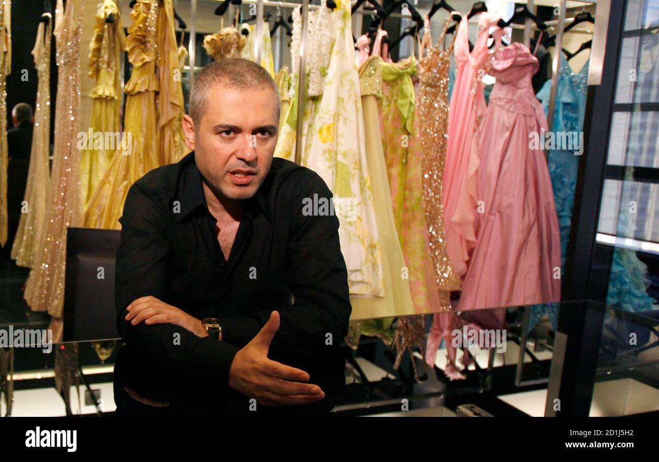 Lebanese Designer Elie Saab speaks during an interview with Reuters in ...