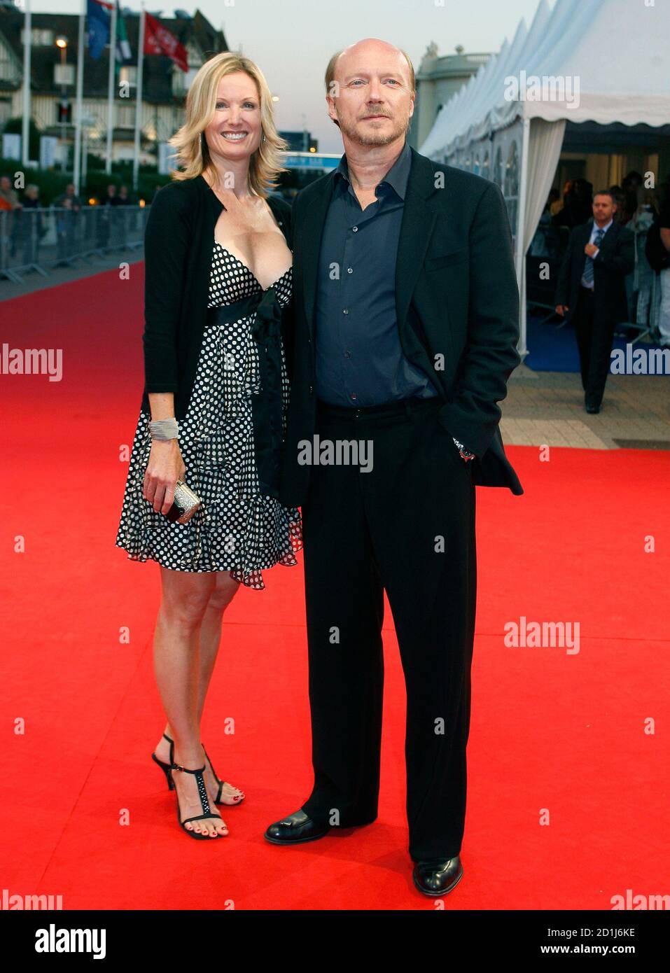 Director Paul Haggis poses with his wife Deborah Rennard as they arrive for  the screening of his film "In The Valley of Elah" at the 33rd Deauville  American Film Festival September 4,