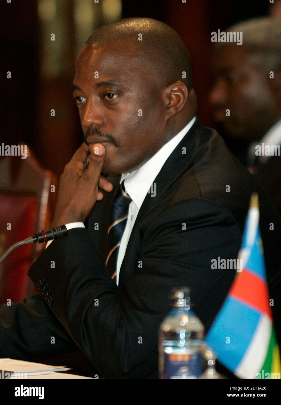Democratic Republic of Congo's President Joseph Kabila attends the opening session of the summit on the ongoing war crisis in eastern Congo in Kenya's capital Nairobi, November 7, 2008. Congolese Tutsi rebels and government troops fought near a refugee camp in east Congo on Friday, forcing thousands of civilians to flee in panic. REUTERS/Thomas Mukoya (KENYA) Stock Photo