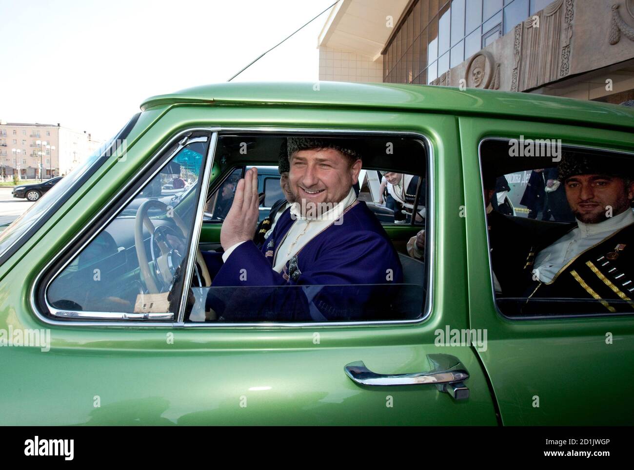 President of Chechnya, Ramzan Kadyrov, dressed in the national costume,  sits behind the steering wheel of the vintage Russian Volga car during The  Day Of Chechen Language celebrations in Grozny April 25,