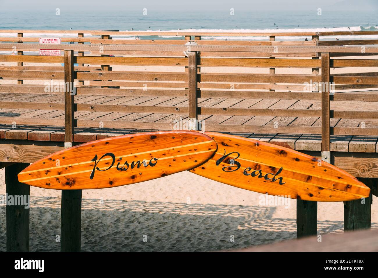 Pismo Beach sign on wooden boardwak. Pismo Beach pier, Central