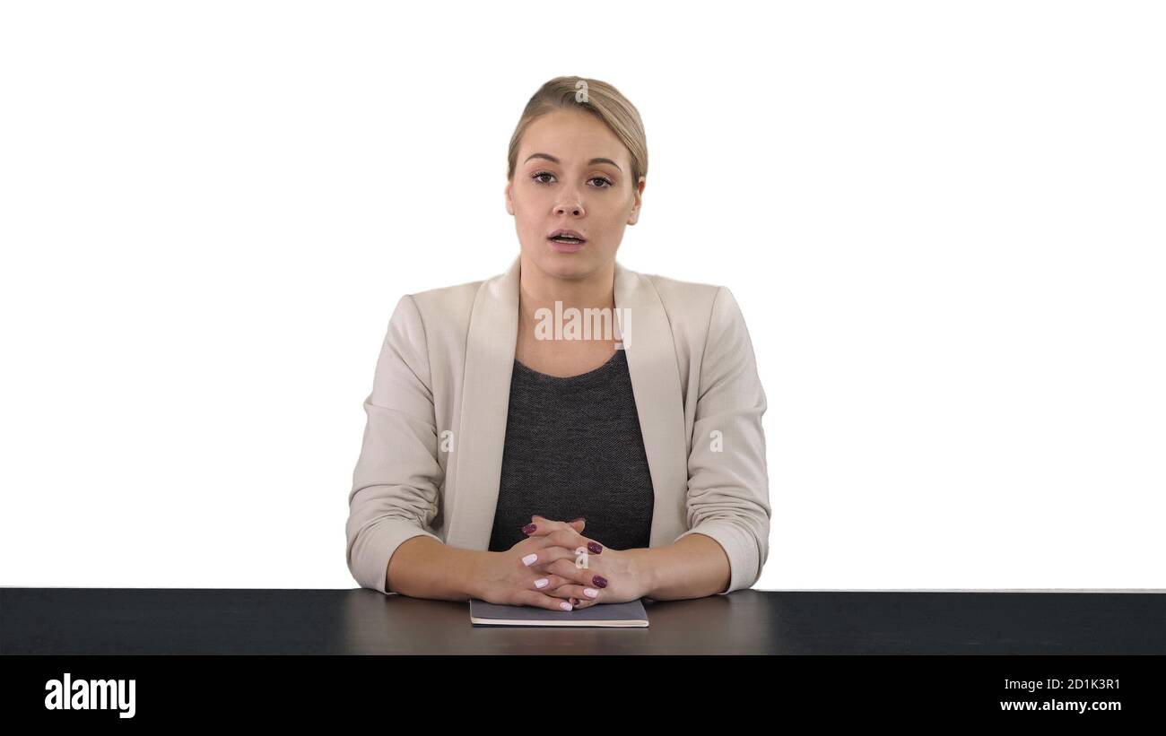 Young beautiful television announcer giving a speach, white back Stock Photo