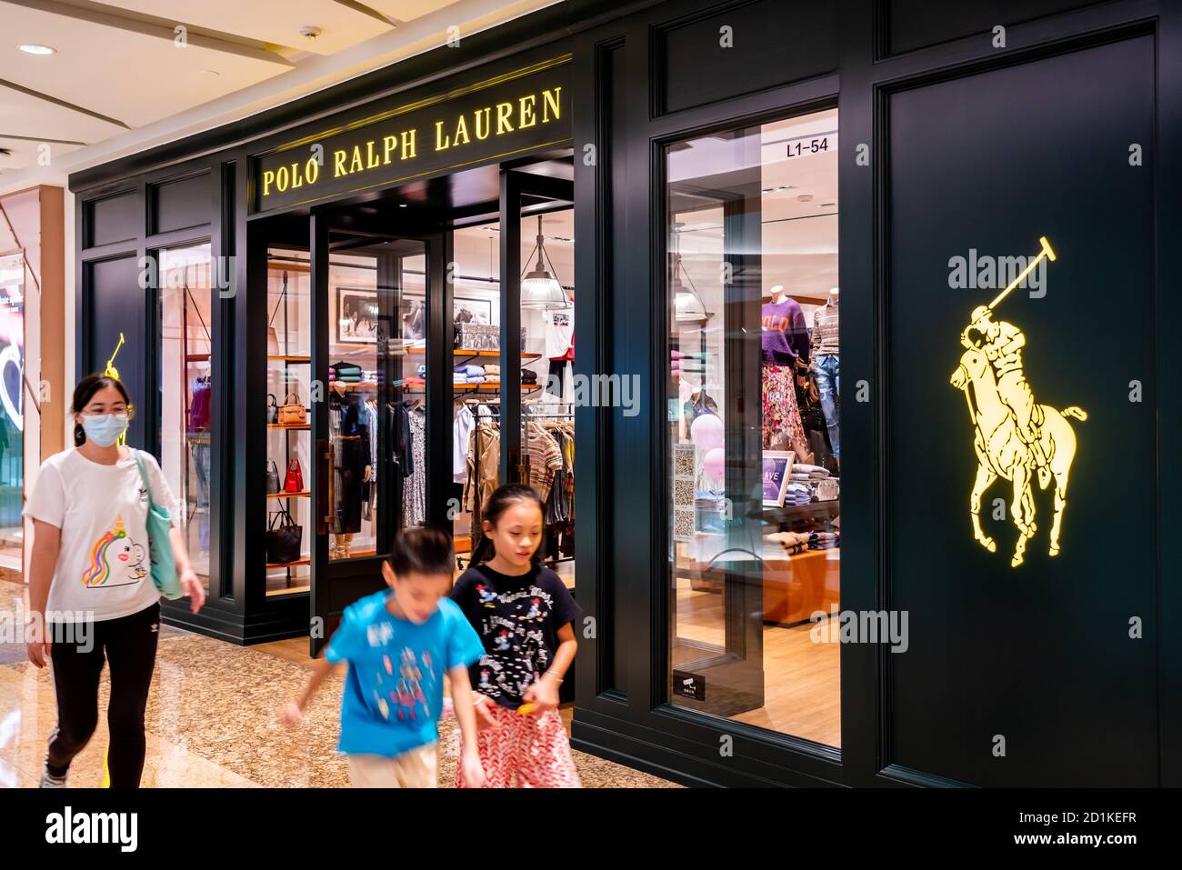 Shenzhen, China. 05th Oct, 2020. Pedestrians walk past a Polo Ralph Lauren  store. Credit: SOPA Images Limited/Alamy Live News Stock Photo - Alamy