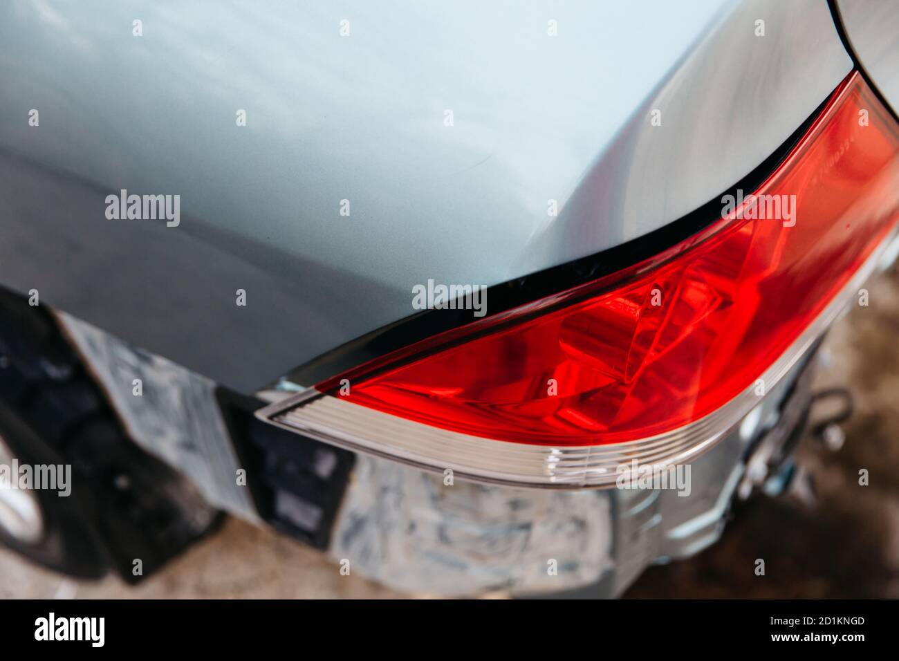 Car tail light broken in an accident. Stock Photo