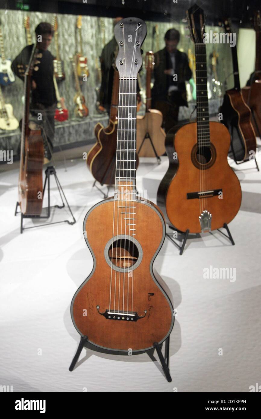 A Jean-Nicolas Grobert Romantic guitar belonging to French musician Hector  Berlioz in 1830 (C) is displayed at the exhibition "Travelling Guitars" in  Paris October 10, 2006. The exhibition traces the development of