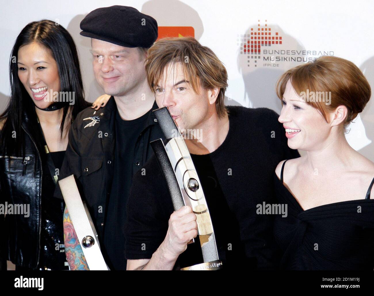 German singer Campino of the band Die Toten Hosen kisses the trophy at the ' Echo Music Awards' ceremony in Berlin, February 21, 2009. The German  Phonographic Academy honours artists from all over