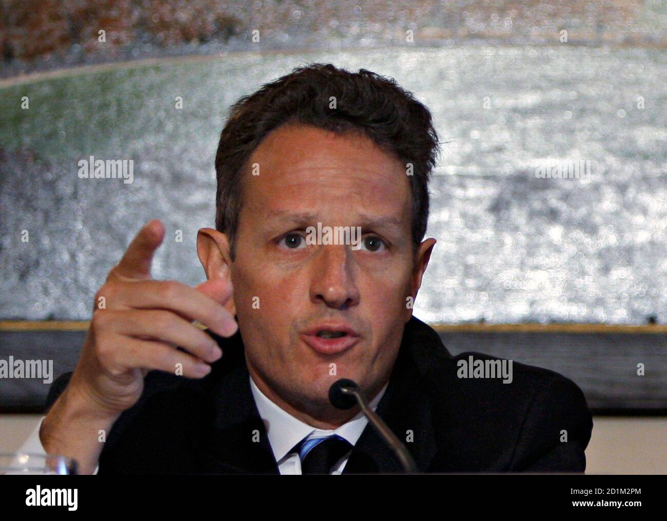 U.S. Treasury Secretary Tim Geithner speaks during a discussion to combat mortgage modification fraud in the housing market at a meeting at the Treasury Department in Washington, September 17, 2009. Geithner said on Thursday the Obama administration has not yet decided whether to extend the $8,000 first-time homebuyer tax credit but was examining the issue closely.   REUTERS/Hyungwon Kang  (UNITED STATES CRIME LAW BUSINESS POLITICS) Stock Photo