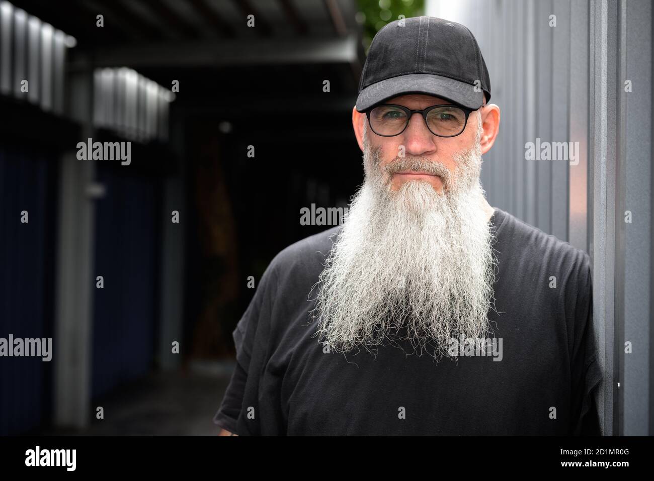 Bearded man in cap glasses hi-res stock photography and images - Alamy