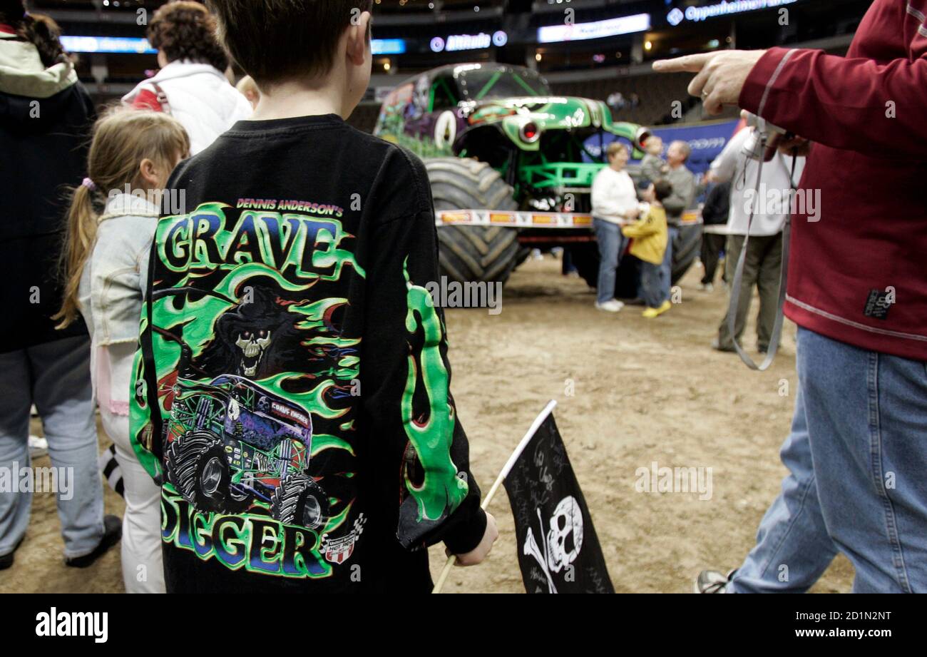 young fan wearing a Grave Digger truck 