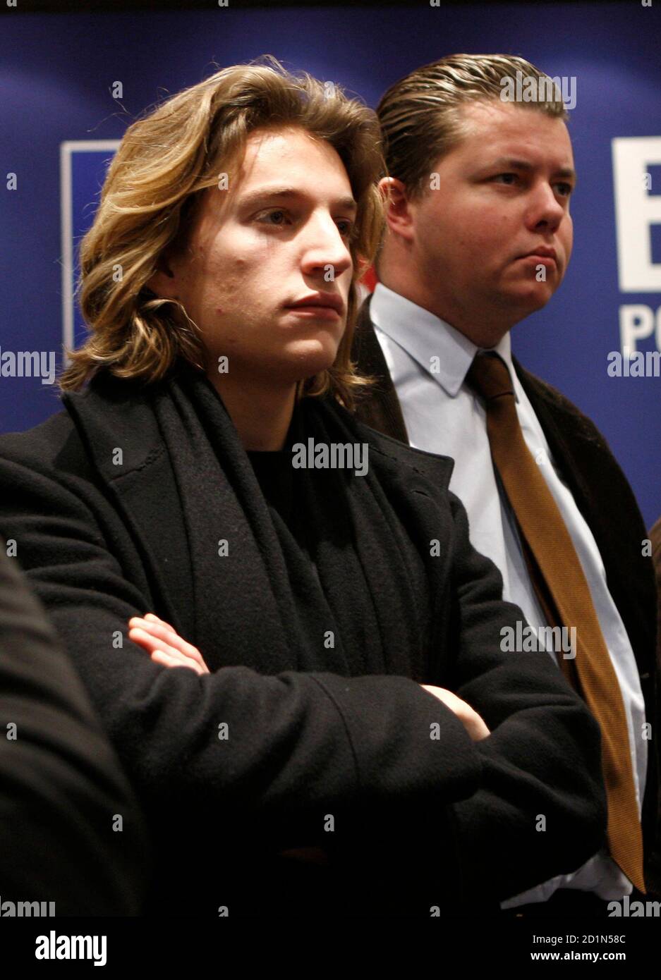 Jean Sarkozy (L) son of France's President Nicolas Sarkozy, attends an  official statement at the UMP headquarters in Paris February 12, 2008. Jean-Christophe  Fromantin got the support of UMP as candidate to