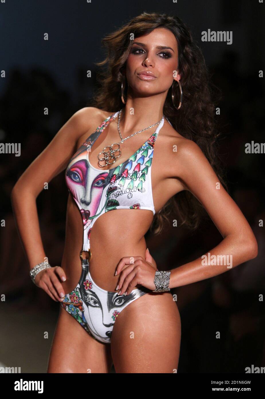 A model walks the runway wearing Ed Hardy swimwear 2009 collection by  designer Christian Audigier during Mercedes-Benz Fashion Week Swim show in  Miami July 19, 2008. REUTERS/Carlos Barria (UNITES STATES Stock Photo -