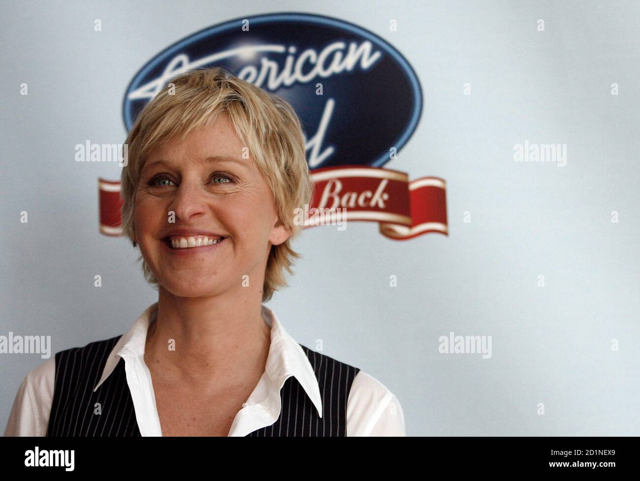 Host Ellen DeGeneres poses before the "Idol Gives Back" show at the Walt  Disney Concert Hall in Los Angeles April 25, 2007. The "American Idol"  special charity event benefits relief programs for