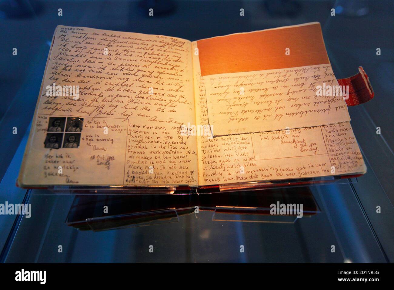 The well-known first diary of Anne Frank sits on display in the Anne Frank House in Amsterdam April 28, 2010. Fifty years after the opening of the Anne Frank House museum, which has more than 1 million visitors every year, the museum is launching an online virtual tour of what life was like at the back of 263 Prinsengracht in Amsterdam. To match Reuters Life! ANNEFRANK-TOUR/   REUTERS/Cris Toala Olivares (NETHERLANDS - Tags: SOCIETY TRAVEL) Stock Photo