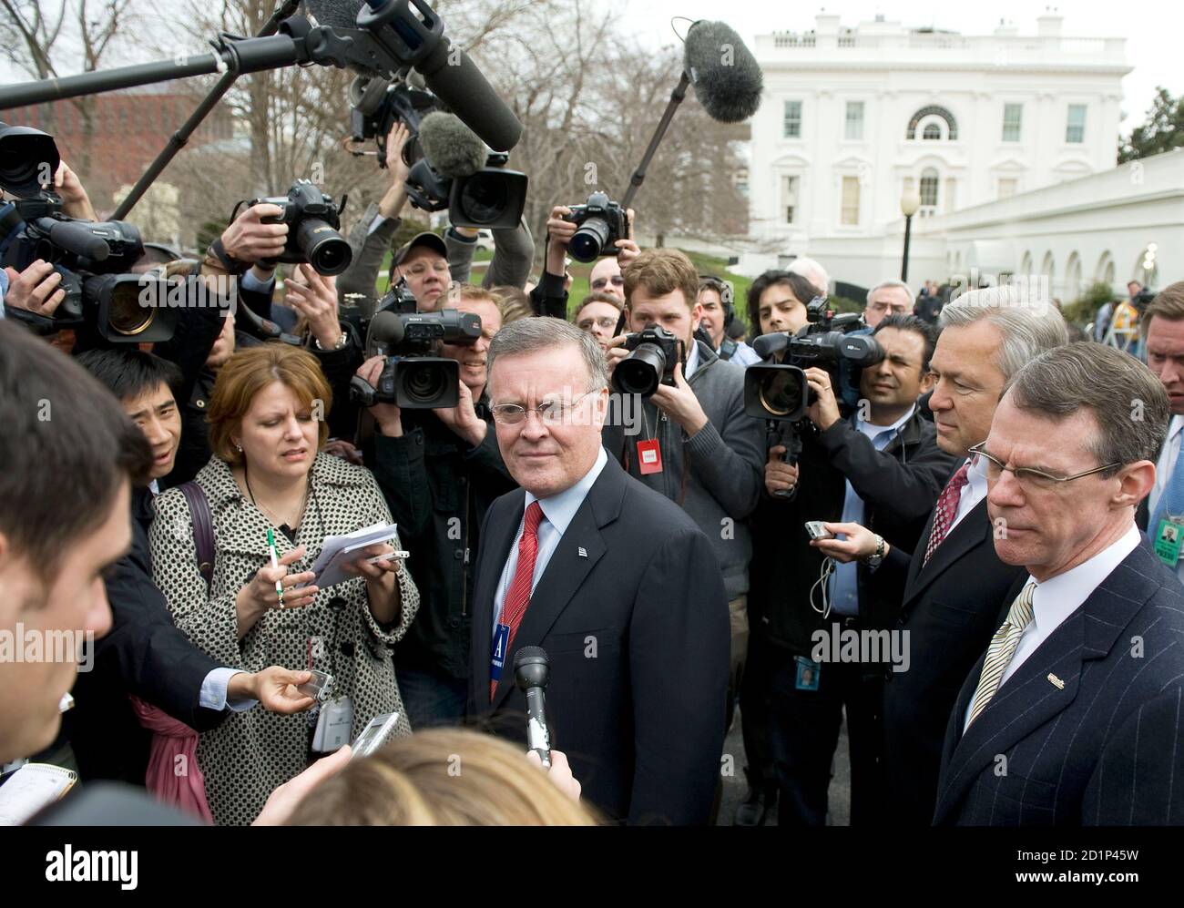 Bank of America Corp. Chief Executive Kenneth Lewis speaks to reporters at the White House after a meeting about the economy with U.S. President Barack Obama in the State Dining Room in Washington, March 27, 2009. Behind him are US Bancorp. Chief Executive Richard Davis (R) and Wells Fargo's Chief Executive John Stumpf (2nd R). Obama meets with top U.S. bankers on Friday to hash out plans to reform Wall Street, rid financial institutions of bad debts and jumpstart lending in an effort to pull the United States out of recession. REUTERS/Larry Downing (UNITED STATES POLITICS BUSINESS) Stock Photo
