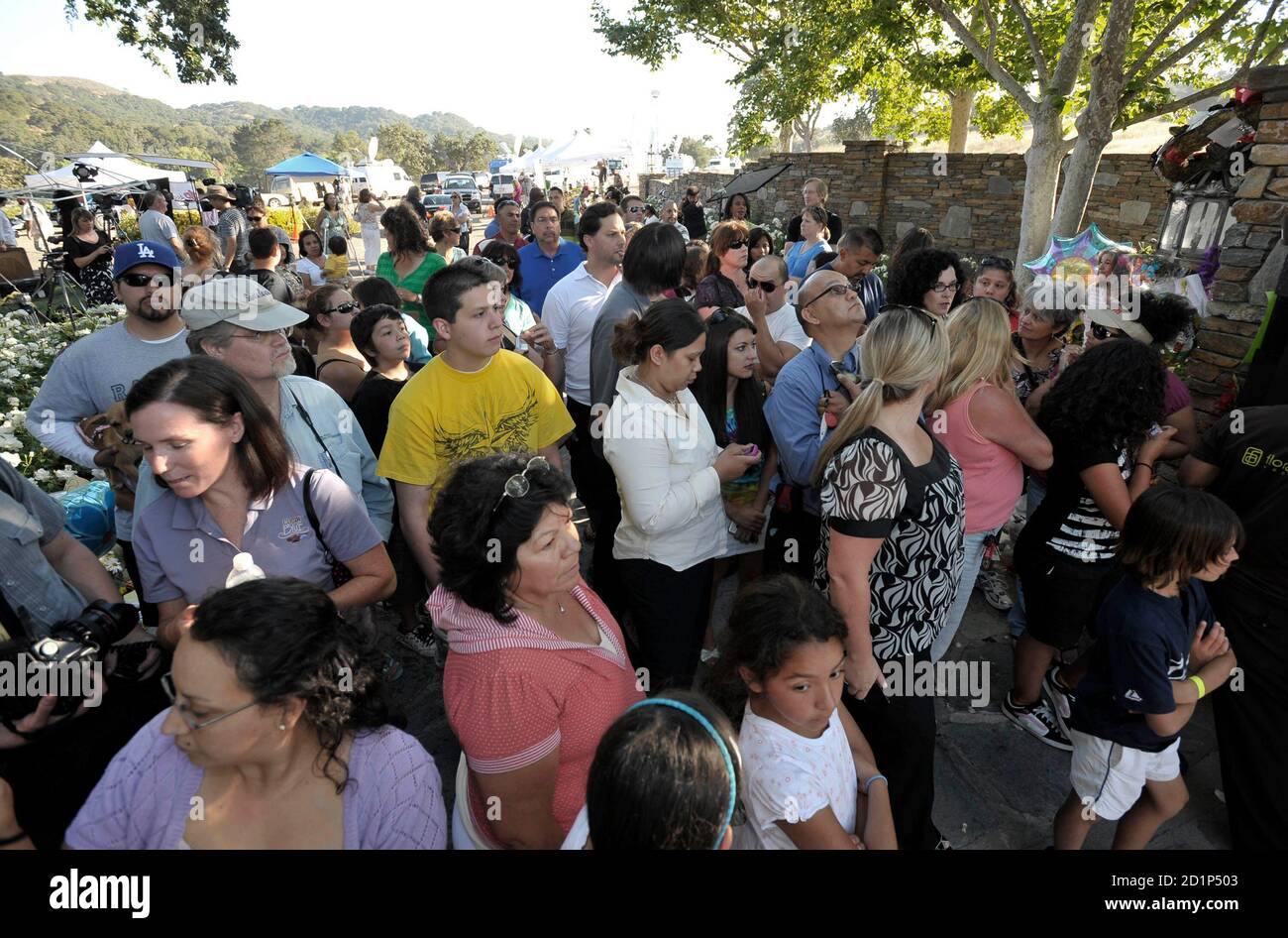 Michael Jackson fans stand outside 