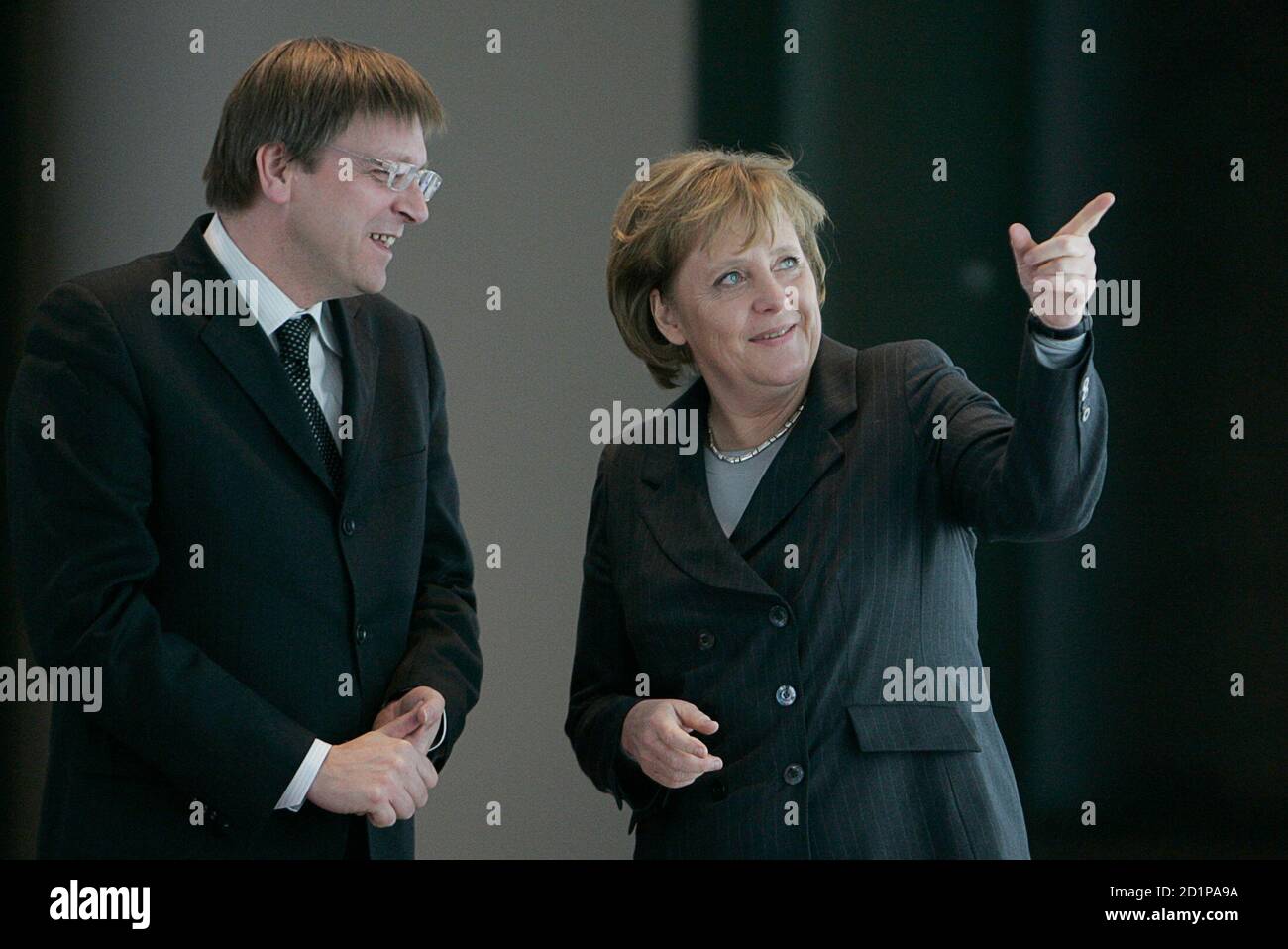 German Chancellor Angela Merkel (R) and Belgian Prime Minister Guy Verhofstadt visit the exhibition '50 Jahre Roemische Vertraege' (The Treaties Of Rome - 50th anniversary) in Berlin February 14, 2007.     REUTERS/Tobias Schwarz     (GERMANY) Stock Photo