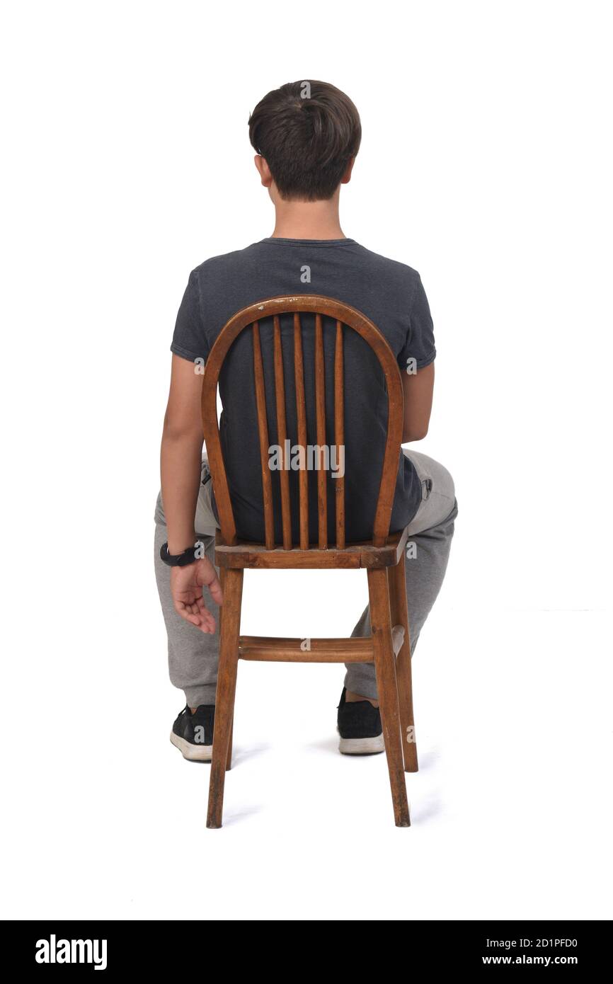 wallpapers Boy Sitting On Chair Back View https www alamy com back view of teenage boy sitting on a chair with white background image379737820 html