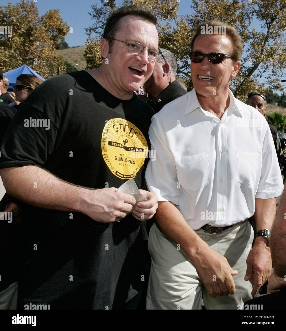 California Governor Arnold Schwarzenegger R Chats With Actor Tom Arnold As He Campaigns At A Biker Rally Held In Support Of U S Troops And Their Families In Trabuco Canyon California October 21