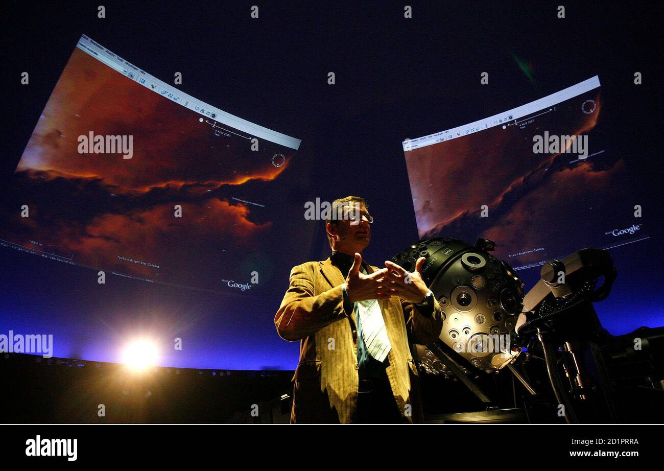 Thomas Krampe, head of the Hamburg planetarium, speaks during a  presentation of Google Sky at the planetarium in Hamburg, northern Germany  August 22, 2007. Popular mapping service Google Earth will launch a