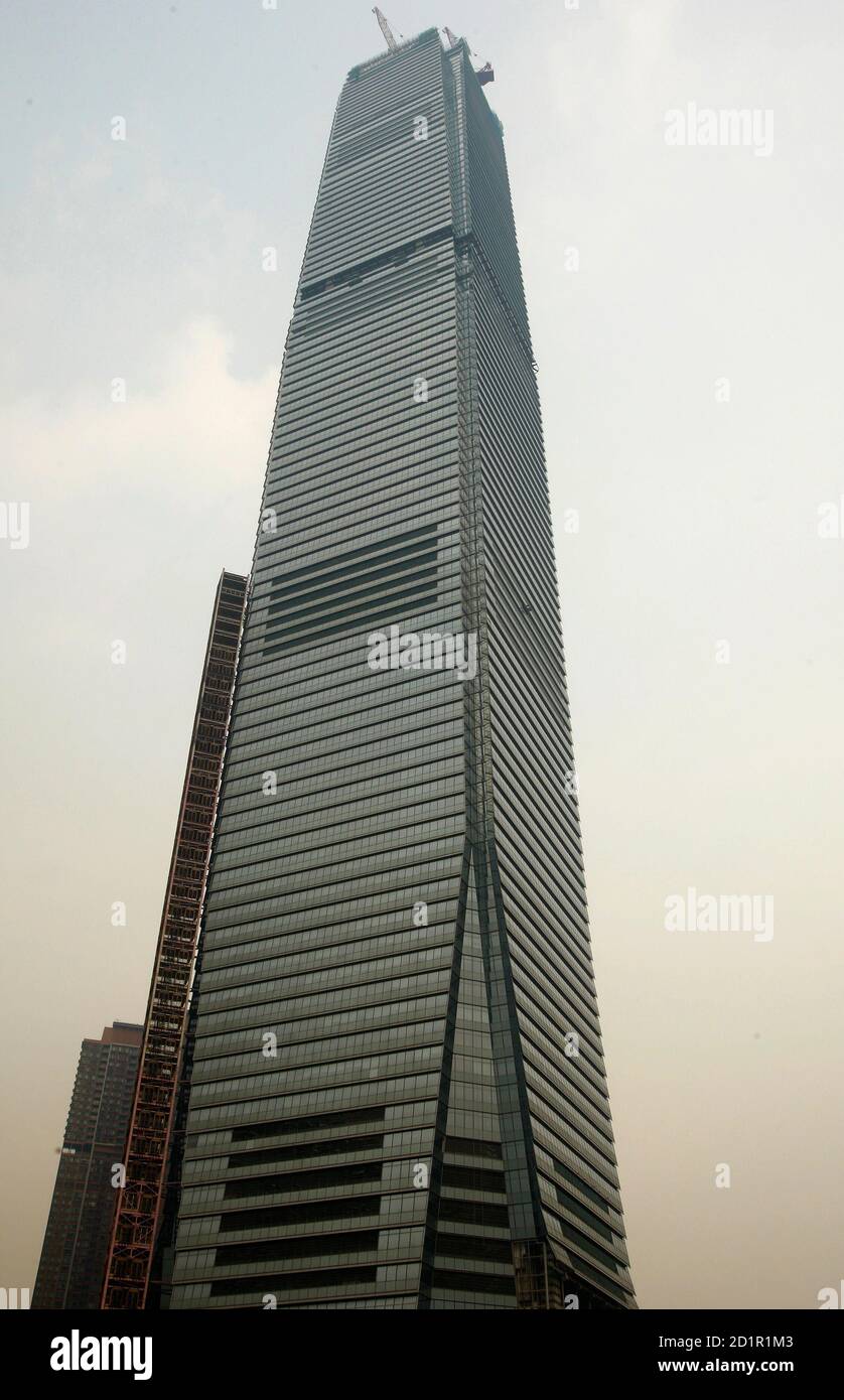 The International Commerce Centre (ICC) is pictured following an accident in Hong Kong September 13, 2009. Five people died on Sunday after falling from a platform in the elevator shaft of the building, police said. One other worker was missing in the shaft after the accident, when the platform collapsed from the 27th floor, Radio Television Hong Kong reported. The 118-floor skyscraper in Kowloon is the city's biggest new project.    REUTERS/Tyrone Siu    (CHINA DISASTER) Stock Photo