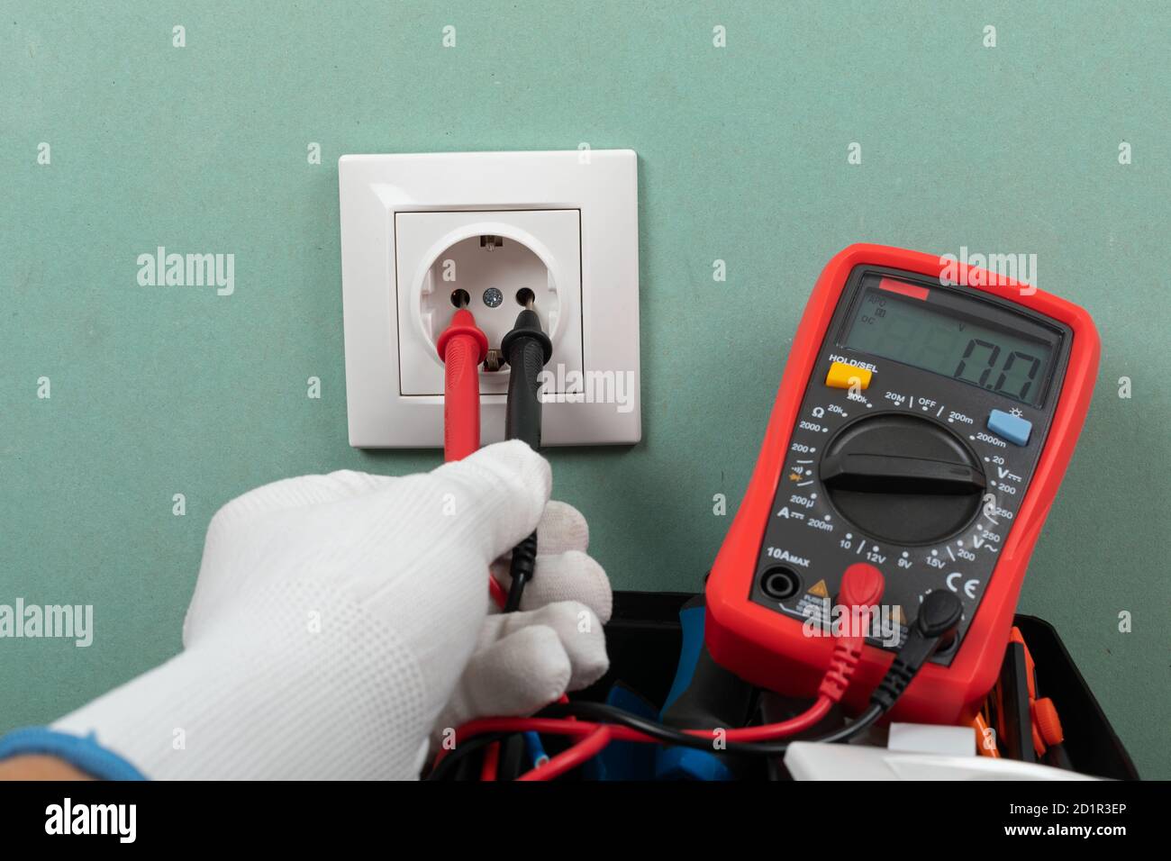 Tools for electrician needs: shocket multimeter, voltage testers, wire strippers, pliers, Stock Photo