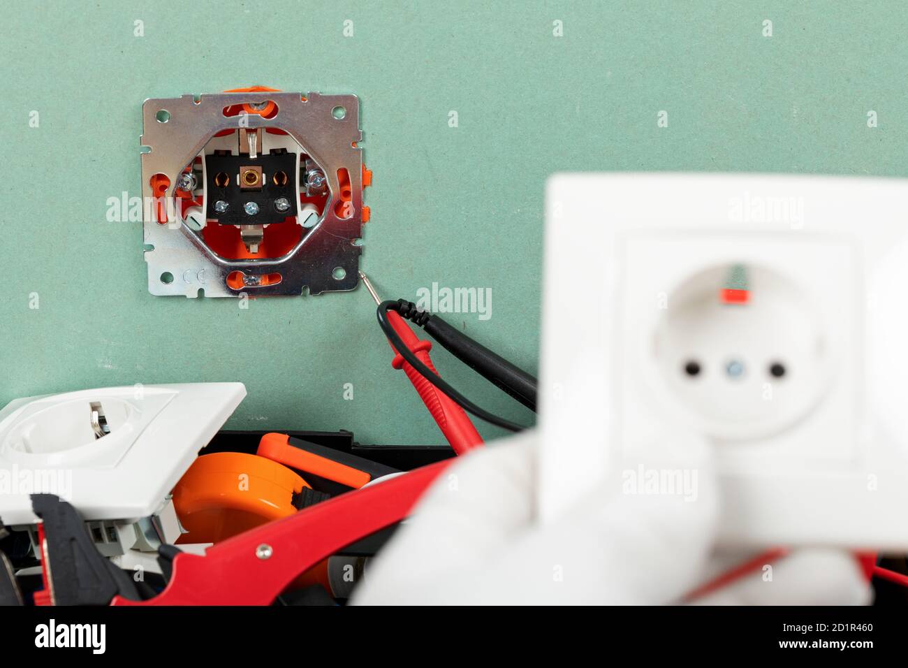 Tools for electrician needs: multimeter, voltage testers, wire strippers, pliers, Stock Photo