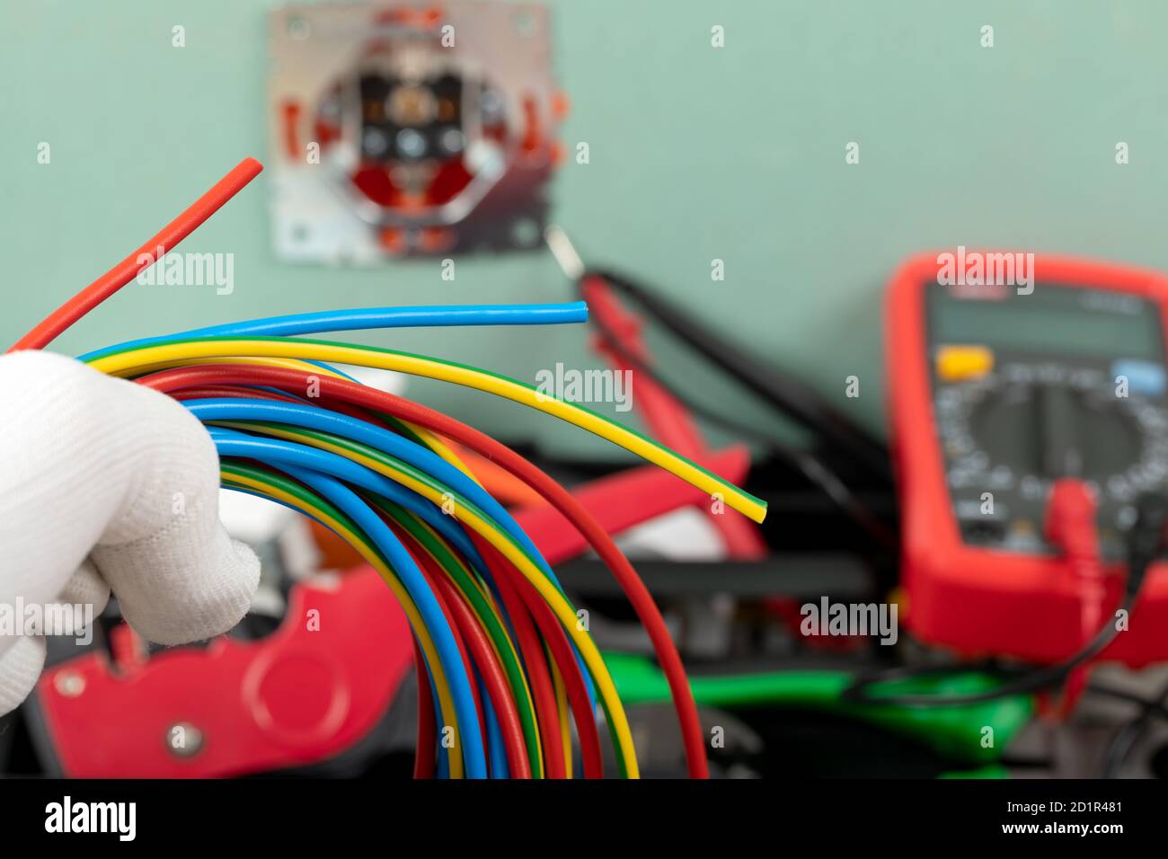 Tools for electrician needs: multimeter, voltage testers, wire strippers, pliers, Stock Photo