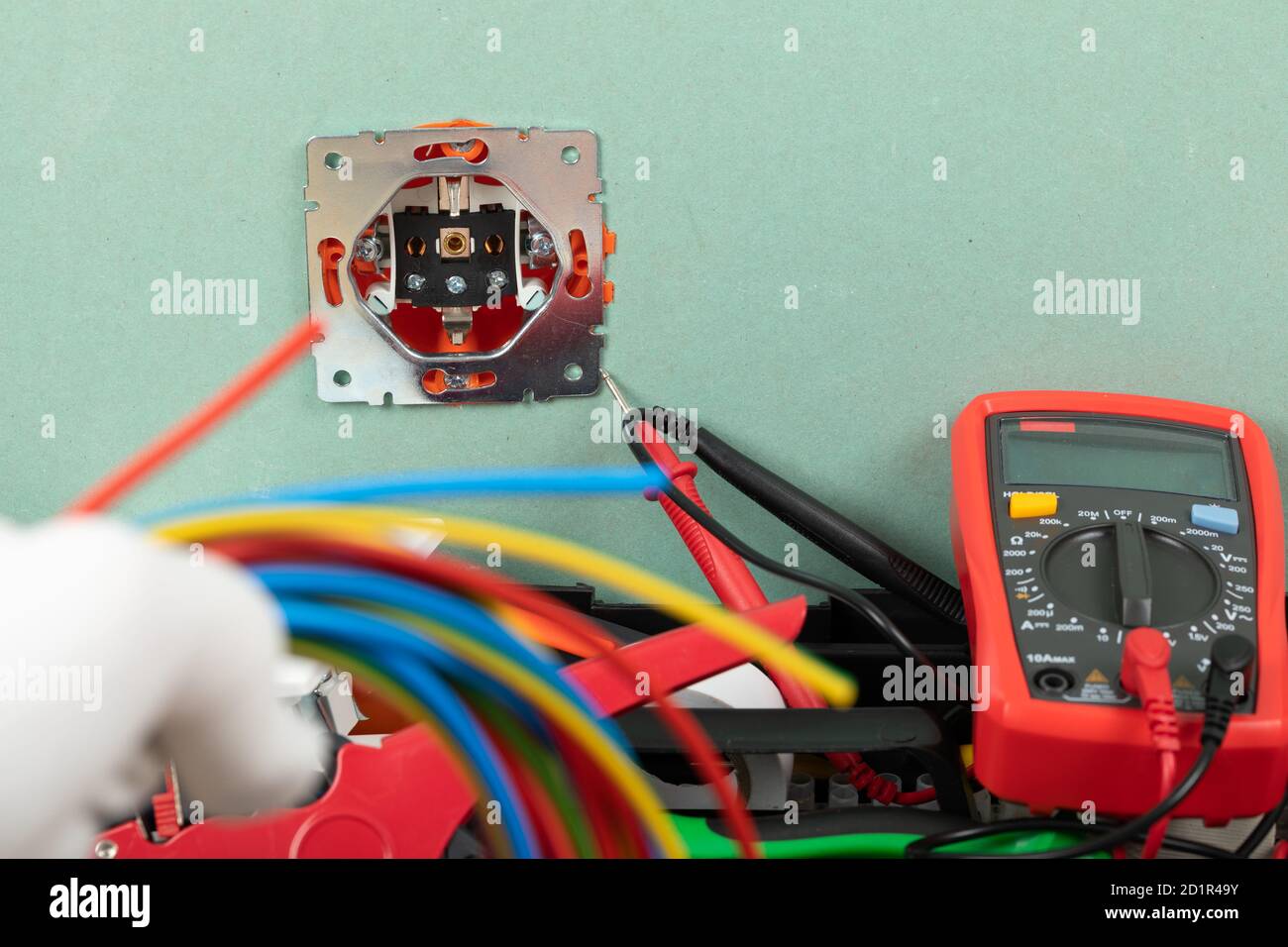 Tools for electrician needs: multimeter, voltage testers, wire strippers, pliers, Stock Photo