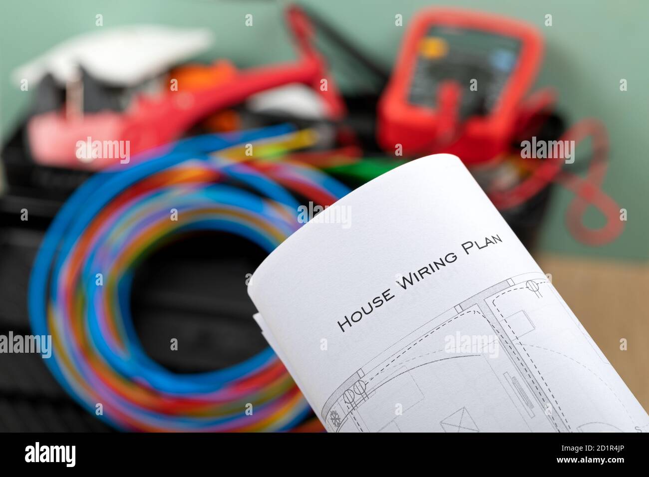 Tools for electrician needs: shocket multimeter, voltage testers, wire strippers, pliers, Stock Photo