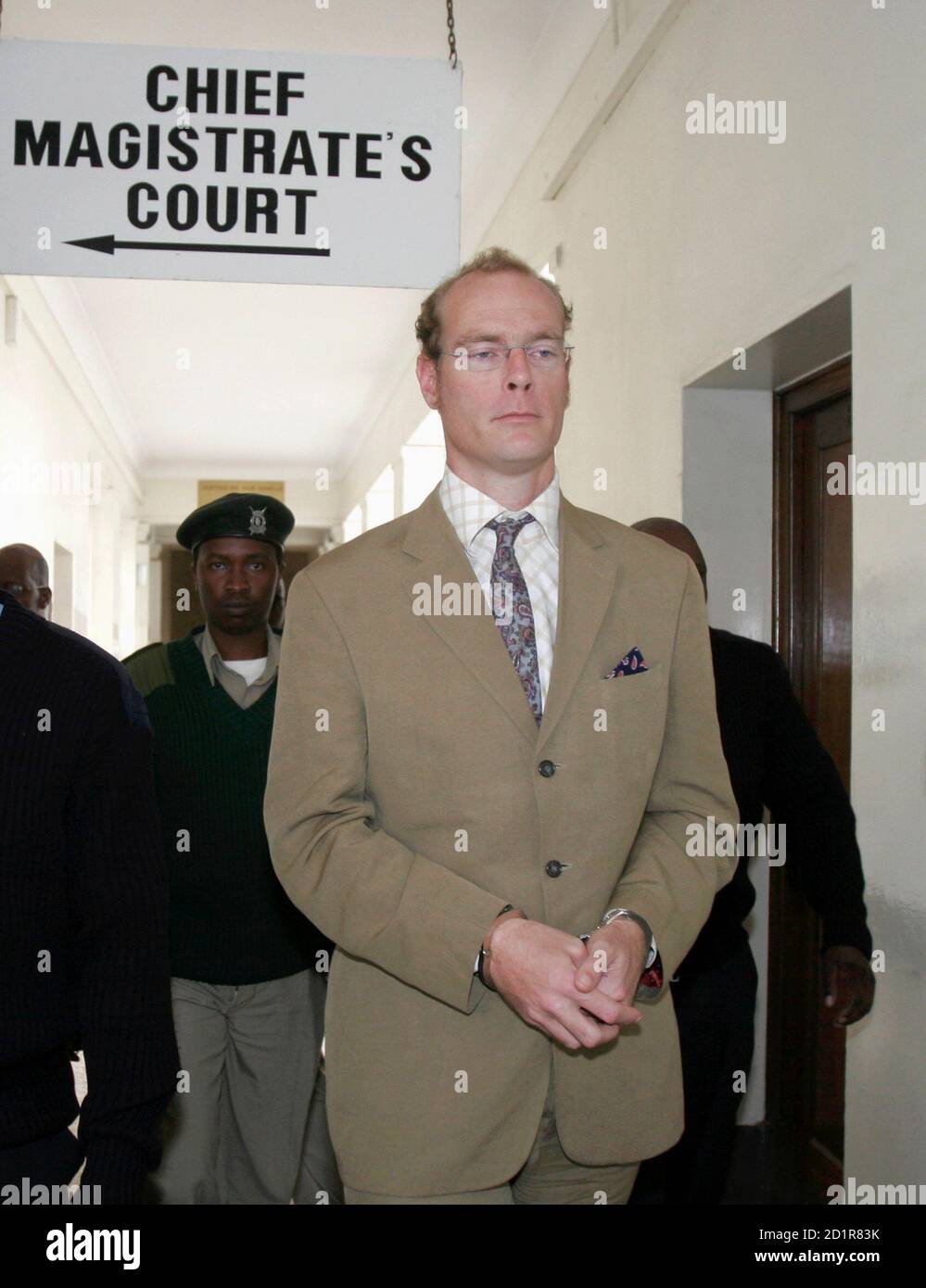 Thomas Cholmondeley arrives for his trial at the Nairobi law court July 27, 2007. A Kenyan court ruled on Wednesday that Cholmondeley, descendant of one of the country's most famous white settlers, should present his defence in a murder case that has stoked longstanding racial tensions. REUTERS/Thomas Mukoya (KENYA) Stock Photo