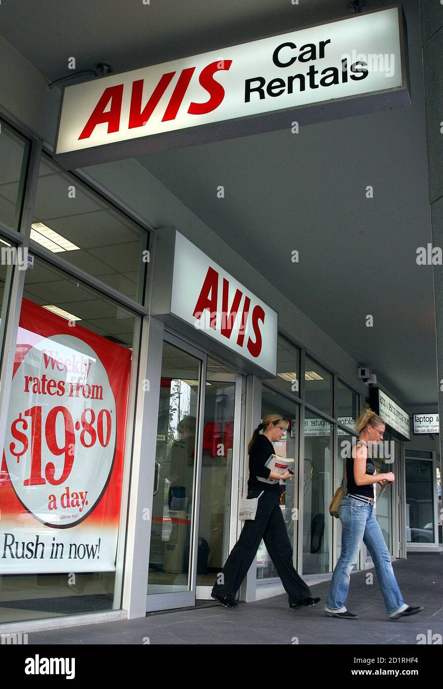 Customers leave an Avis car rental office in Sydney's Kings Cross October  24, 2005. Travel, lodging and real estate services company Cendant Corp.  said on Monday it would split into four pure-play
