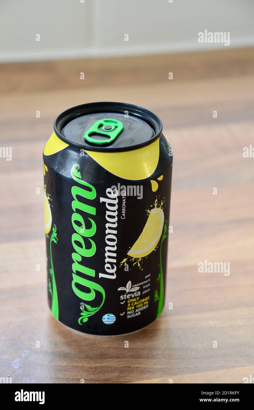 green cola company cola and lemonade fizzy soda drinks in tin cans on