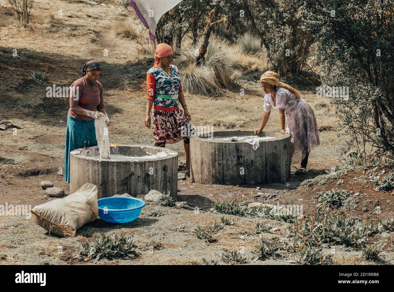 https://c8.alamy.com/comp/2D1RRB8/simien-mountain-ethiopia-april-25th2019-ethiopian-women-wash-clothes-in-the-traditional-way-outdoors-in-simien-mountains-ethiopia-april-25-2019-2D1RRB8.jpg