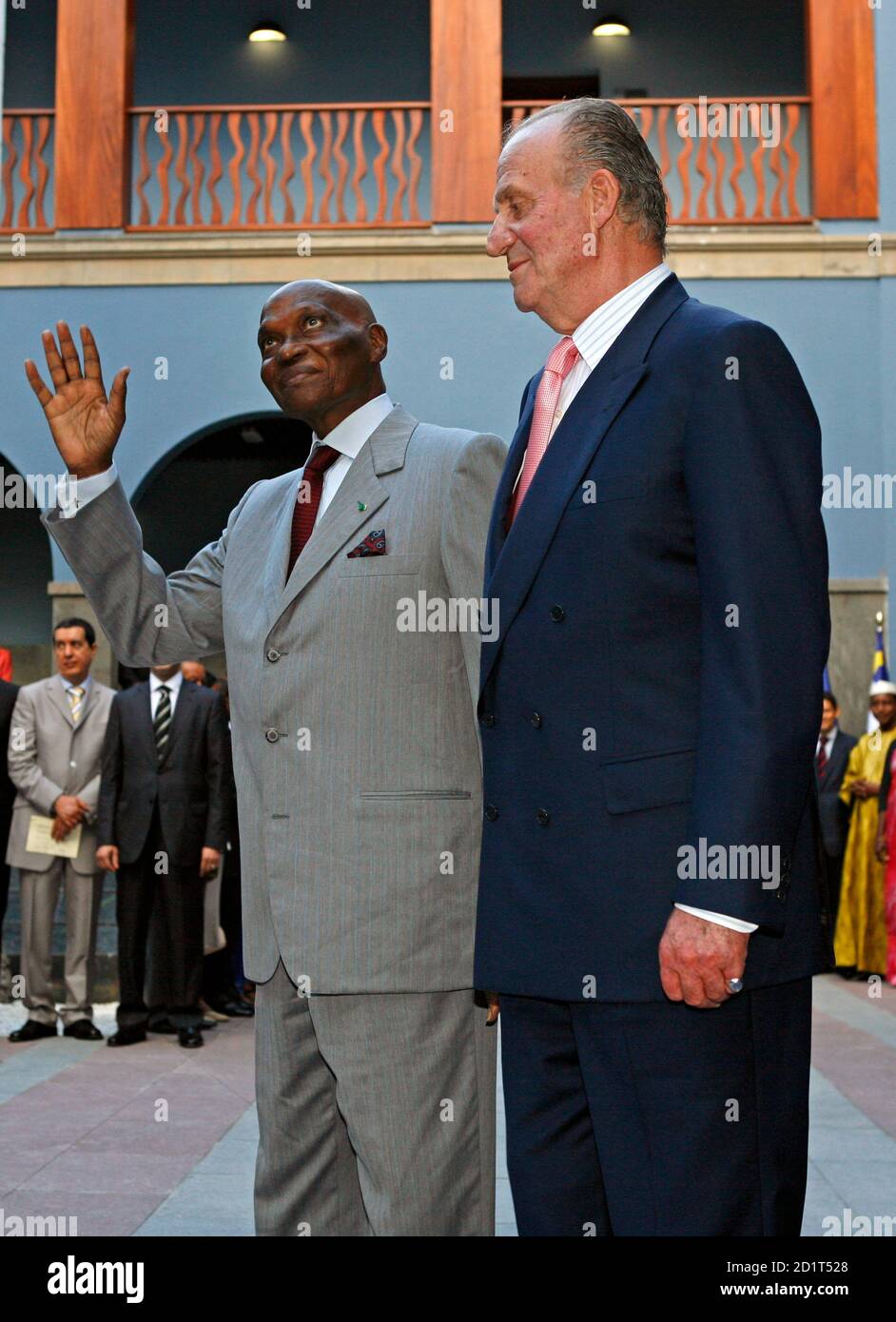 Senegal's President Abdoulaye Wade (L) waves as he stands with Spain's King  Juan Carlos during the inauguration of "Casa Africa" (Africa House) in Las  Palmas in Spanish Canary island of Gran Canaria
