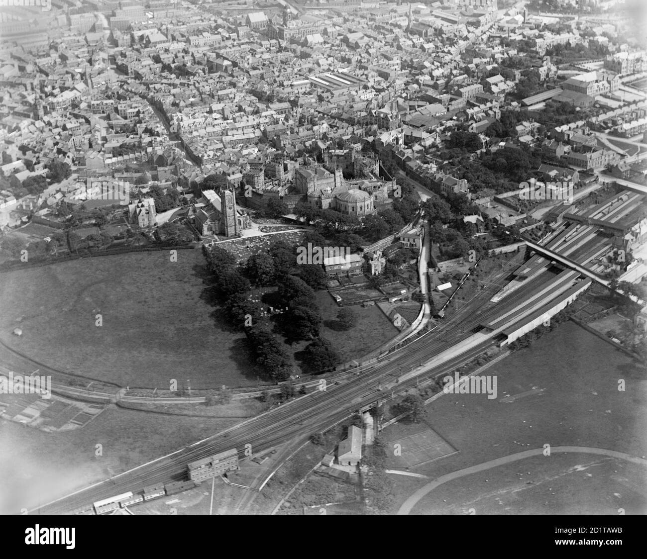 LANCASTER, Lancashire. Aerial view of Lancaster with the Castle, church and railway station. Lancaster Castle houses the Shire Hall and County Court and until 2011 it was used as a prison. The castle keep dates from the 12th century.  Photographed in July 1920. Aerofilms Collection (see Links). Stock Photo