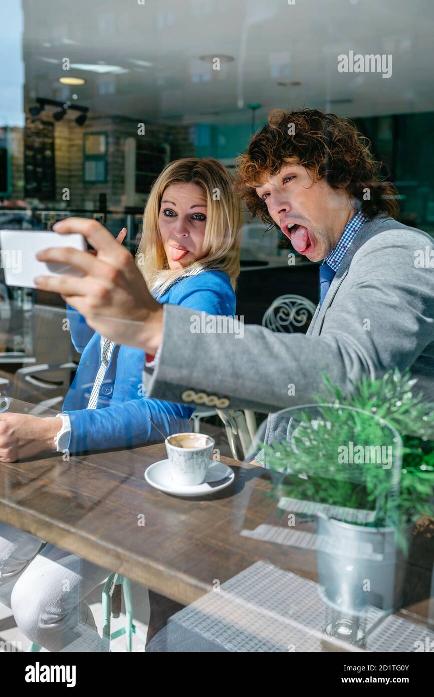 Coworkers taking a selfie Stock Photo