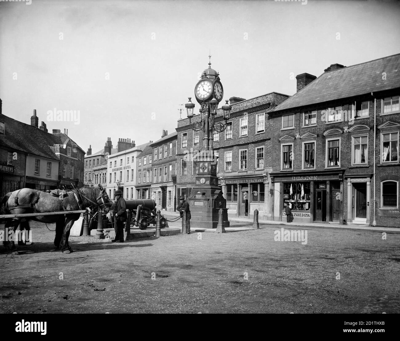 NEWBURY, Berkshire. The clock that commemorates the Golden Jubilee of Queen Victoria (1887) stands at the three-way junction of the London and Bath roads in the town. Photographed in 1890 by Henry Taunt. Stock Photo
